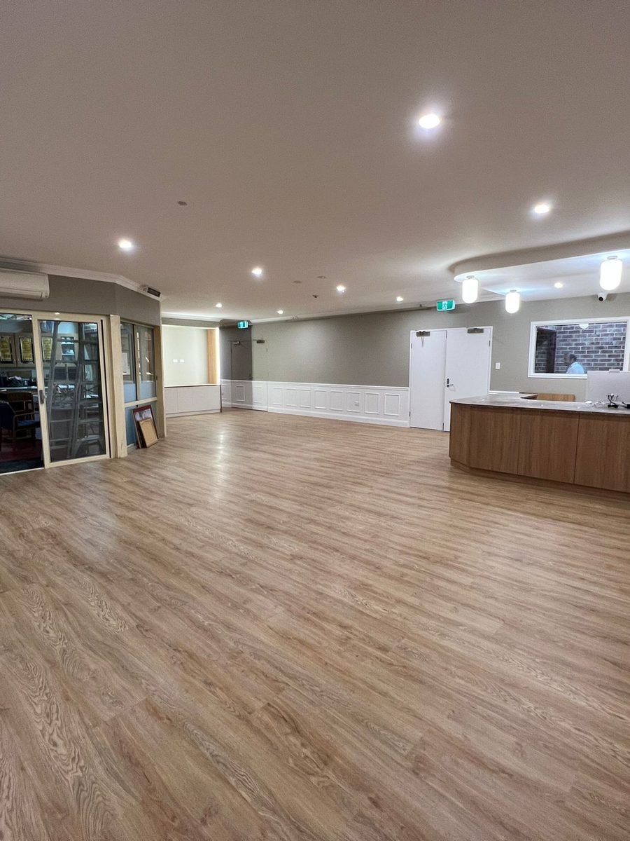 Function room finished with set bulkheads, downlights and new flooring