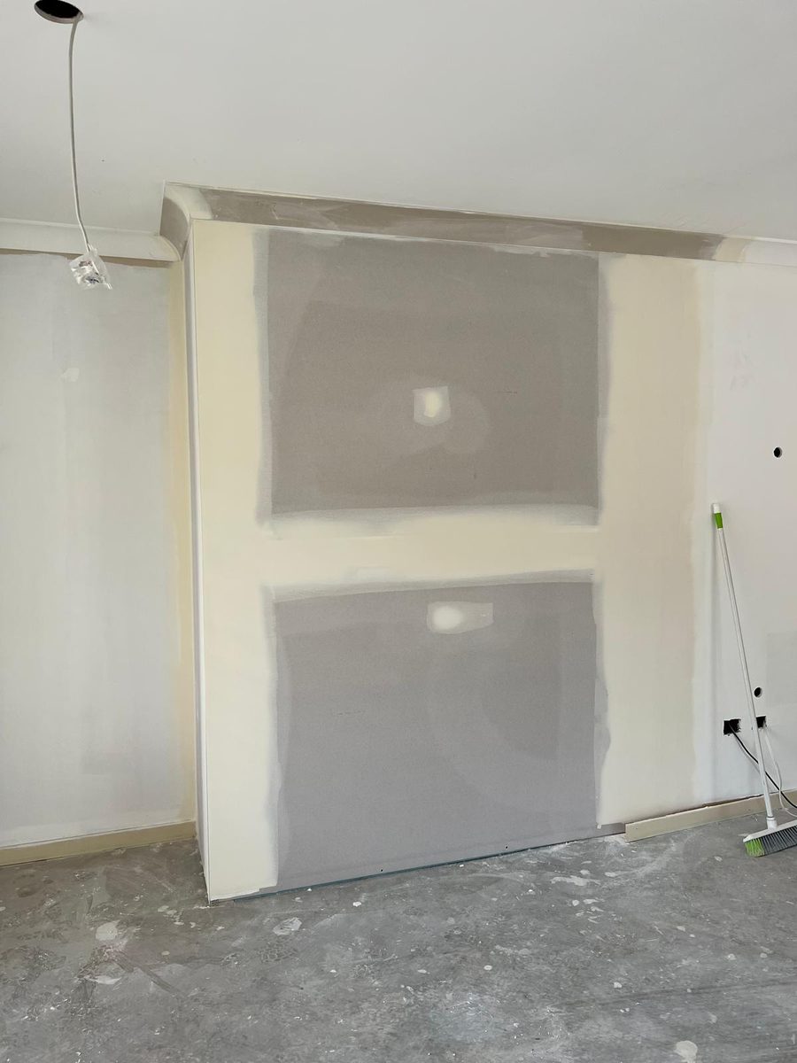 Large wall patch set flush into the surrounding lining and left to dry