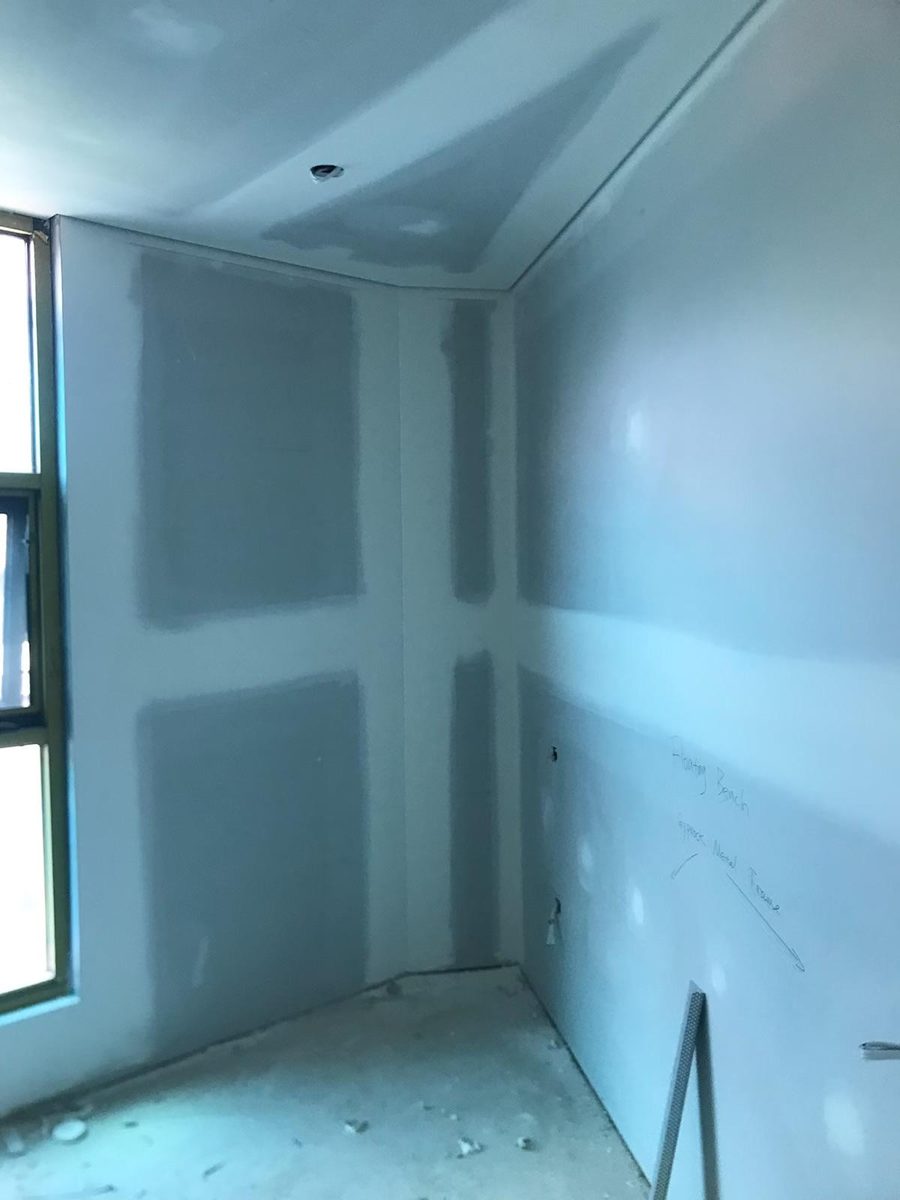 Room sheeted and given a first coat over the joints and fixings